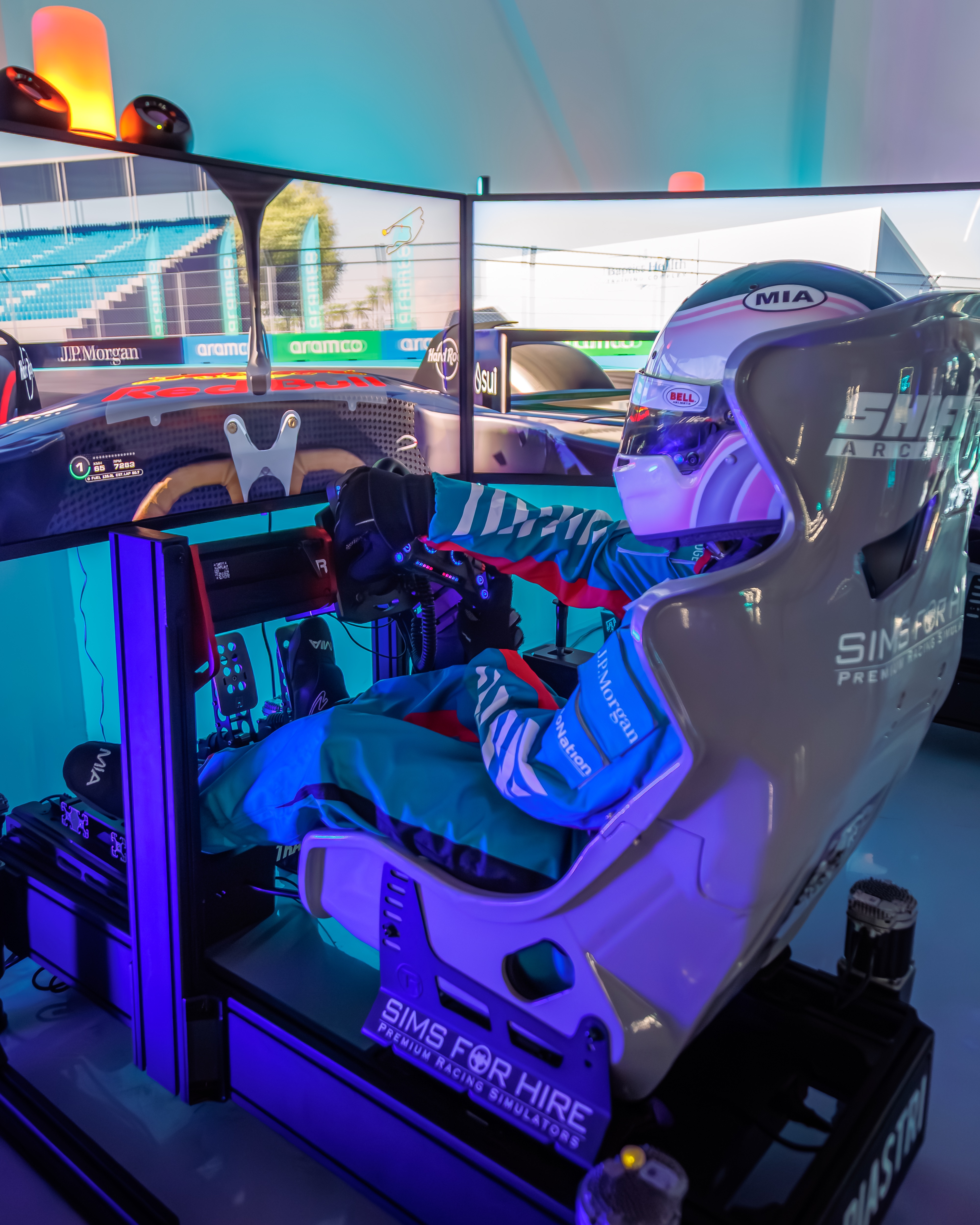 SimsForHire crew in racing suits at Miami Autodrome