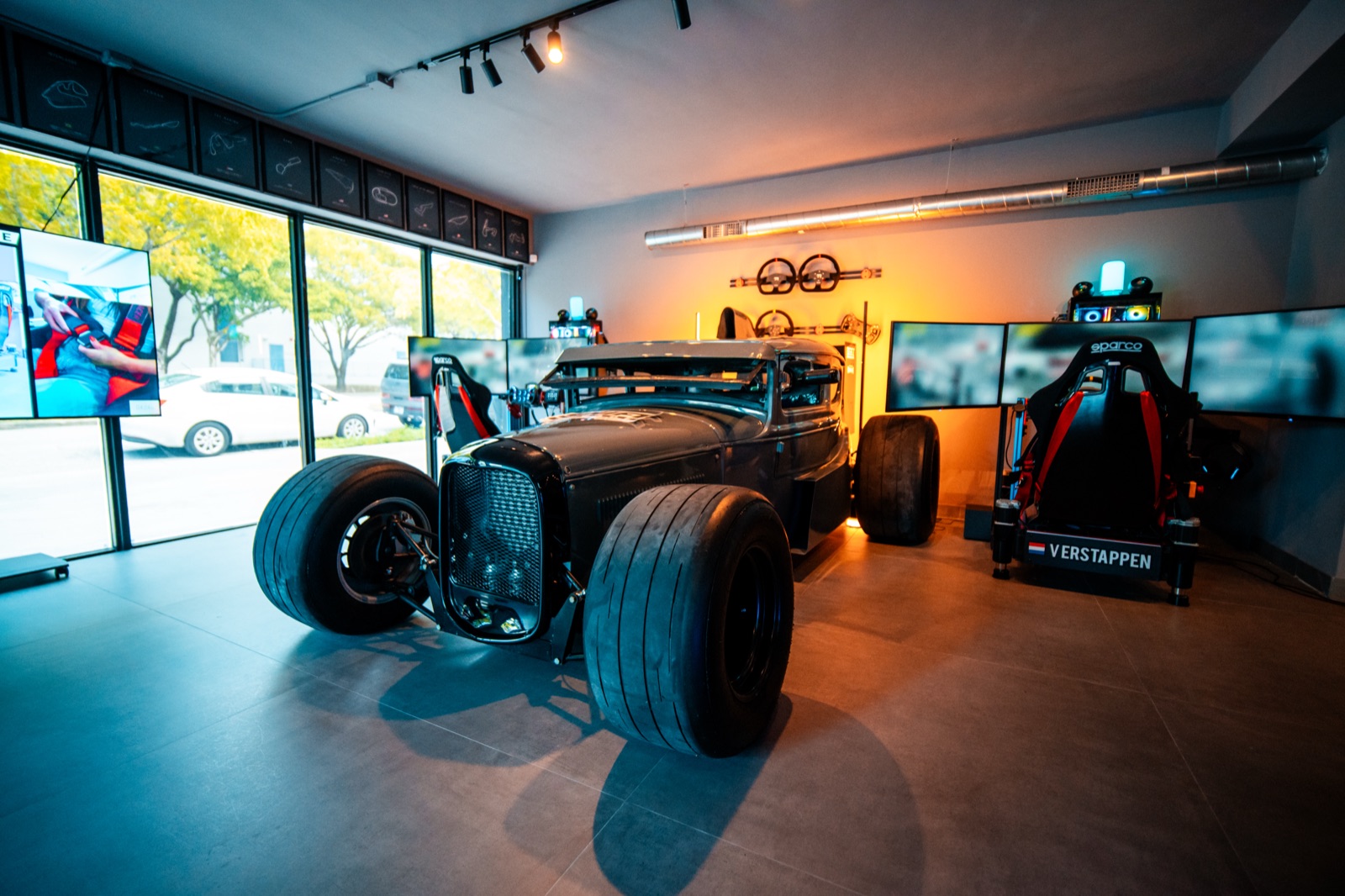 Full-motion racing simulator rig with triple screens in Highland Beach