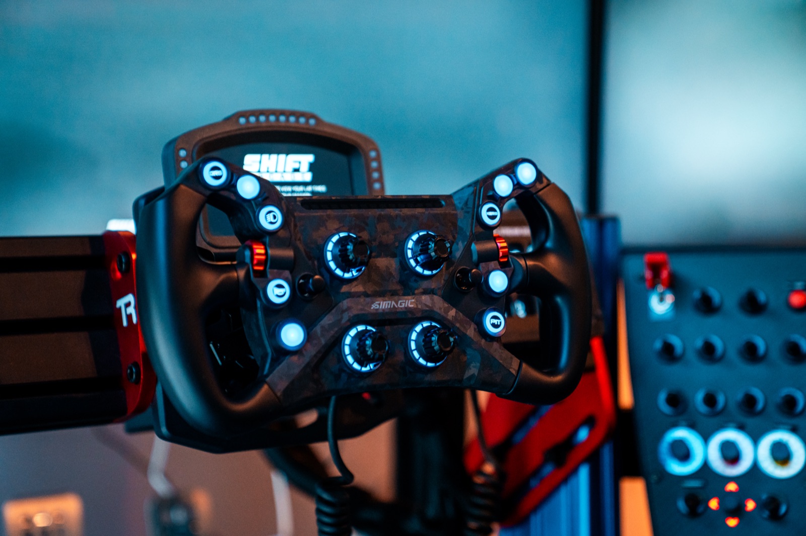 Full-motion racing simulator rig with triple screens in Davie