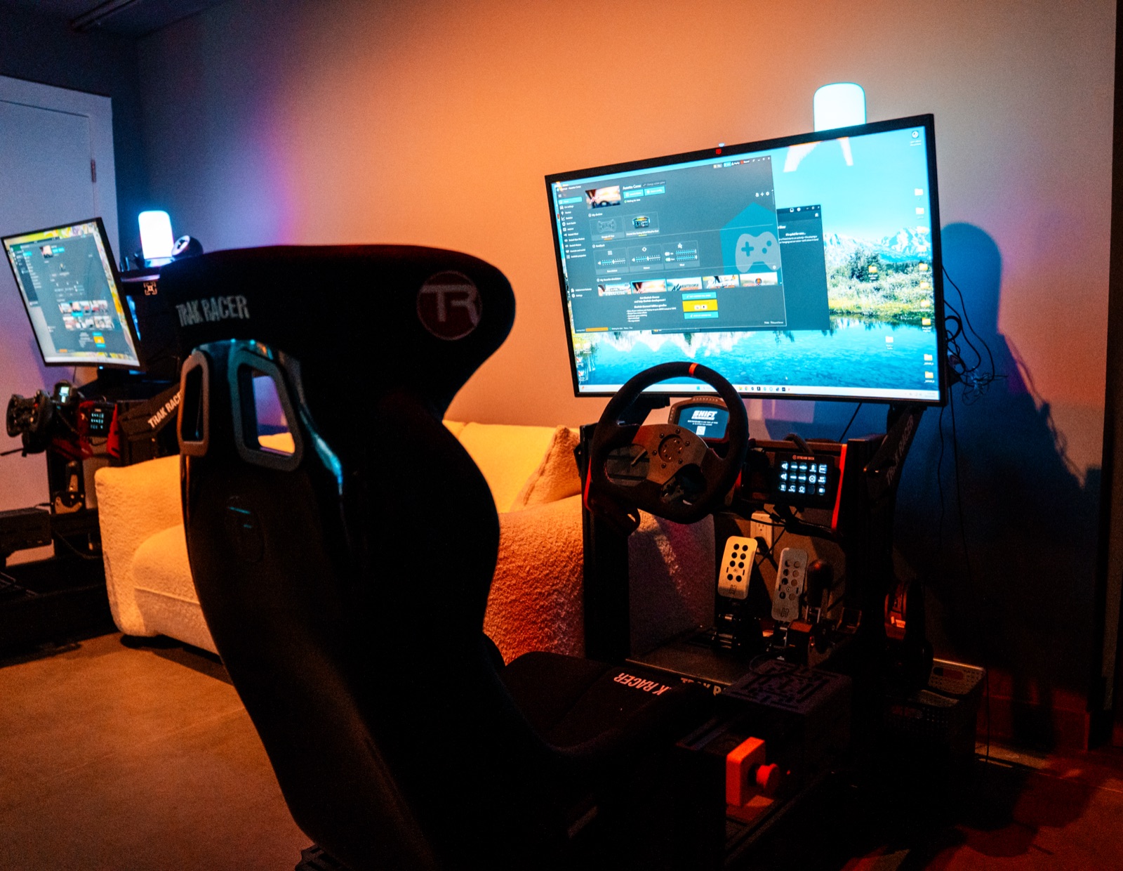 Full-motion racing simulator rig with triple screens in Tamarac