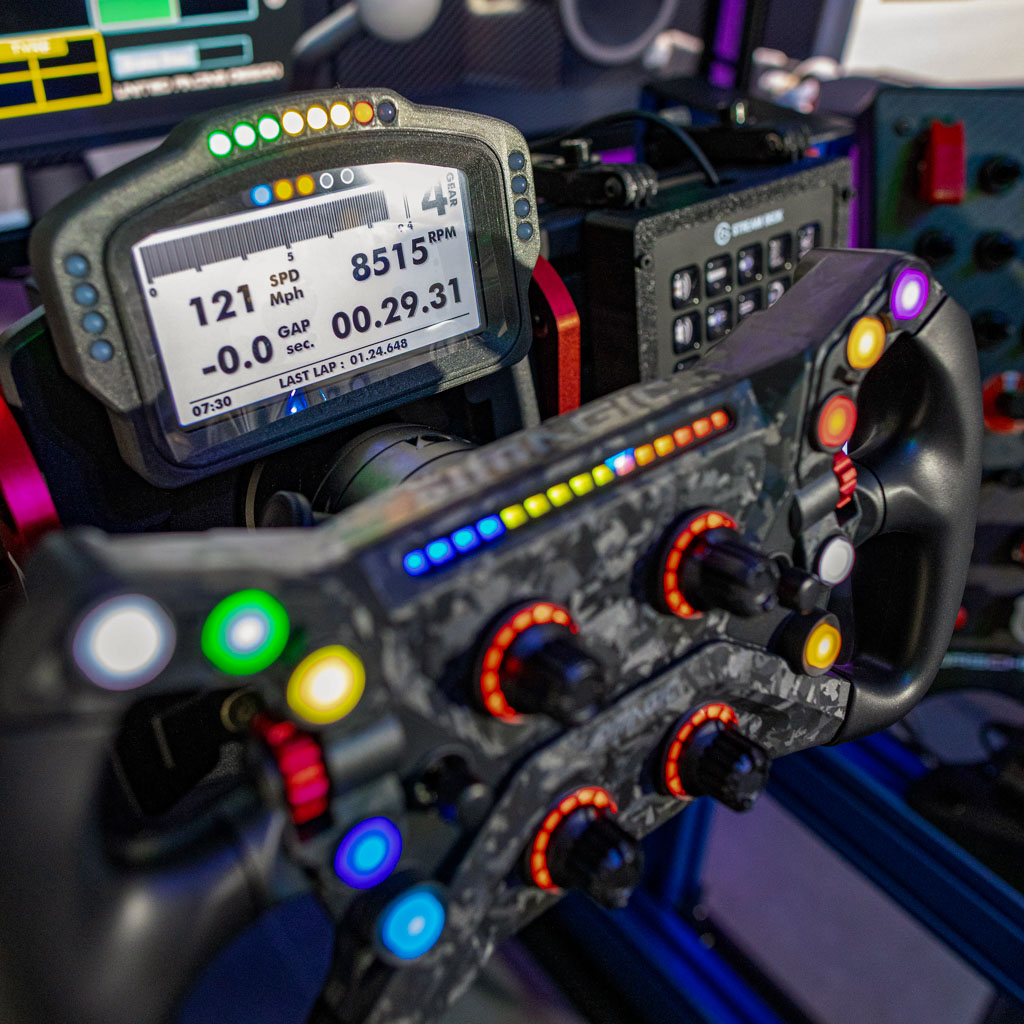 Full-motion racing simulator rig with triple screens in Hollywood