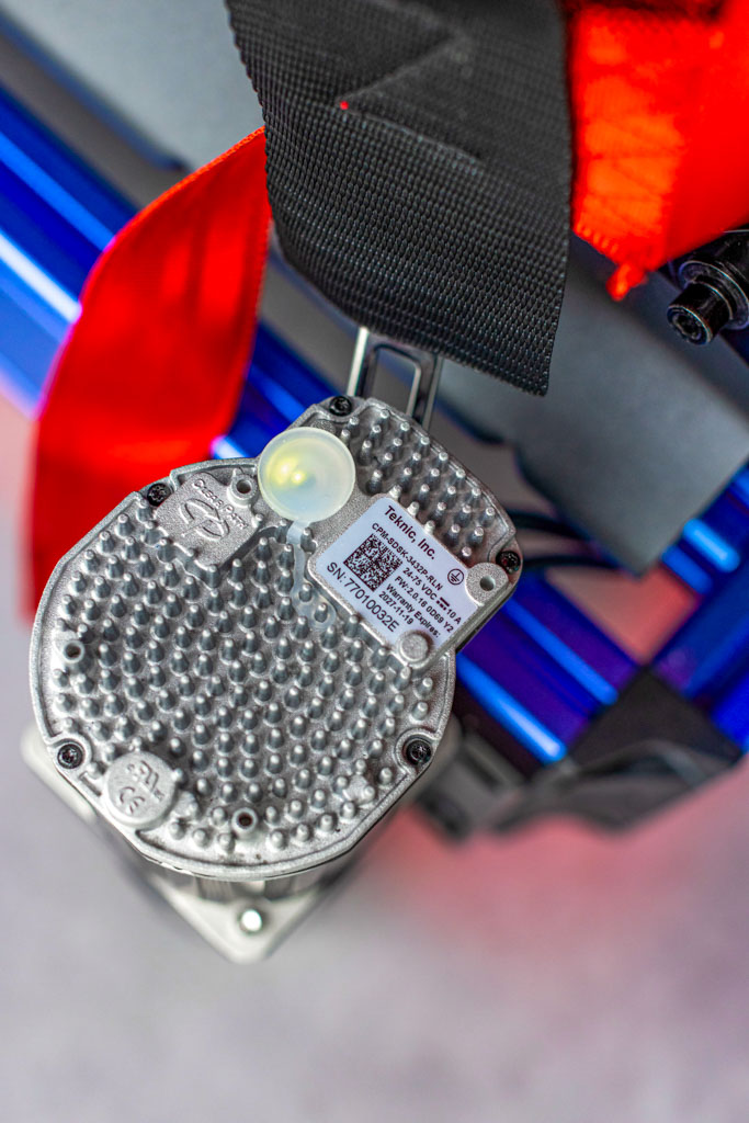 Full-motion racing simulator rig with triple screens in Coconut Creek